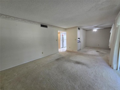 2nd floor condo located in the 55+ community of Live Oak Village on Country Club At Silver Springs Shores in Florida - for sale on GolfHomes.com, golf home, golf lot