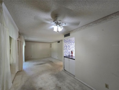2nd floor condo located in the 55+ community of Live Oak Village on Country Club At Silver Springs Shores in Florida - for sale on GolfHomes.com, golf home, golf lot