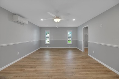 Welcome to this beautifully expanded Gardenia model in Sunset on The Links of Spruce Creek in Florida - for sale on GolfHomes.com, golf home, golf lot