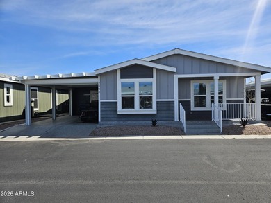 Experience luxury living in this spacious triple-wide home on Viewpoint Golf Resort in Arizona - for sale on GolfHomes.com, golf home, golf lot