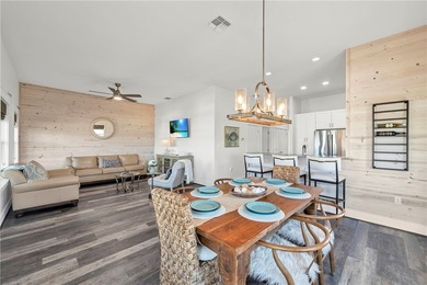 This 4-bedroom, 3-bathroom home is just a short golf cart ride on Palmilla Beach Golf Club in Texas - for sale on GolfHomes.com, golf home, golf lot