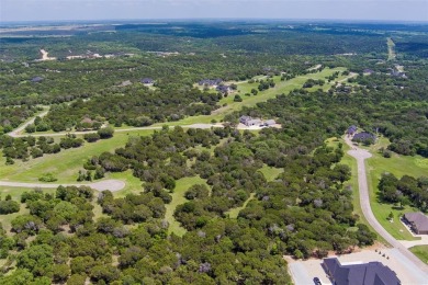 Imagine your dream home tucked within the trees on this over an on The Retreat in Texas - for sale on GolfHomes.com, golf home, golf lot