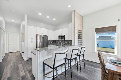 This 4-bedroom, 3-bathroom home is just a short golf cart ride on Palmilla Beach Golf Club in Texas - for sale on GolfHomes.com, golf home, golf lot