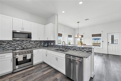 This 4-bedroom, 3-bathroom home is just a short golf cart ride on Palmilla Beach Golf Club in Texas - for sale on GolfHomes.com, golf home, golf lot