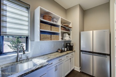 Mountain Modern Main Channel Lakefront Estate built new in 2022 on Tanasi Golf Course in Tennessee - for sale on GolfHomes.com, golf home, golf lot