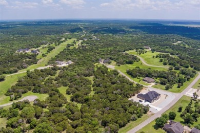 Imagine your dream home tucked within the trees on this over an on The Retreat in Texas - for sale on GolfHomes.com, golf home, golf lot