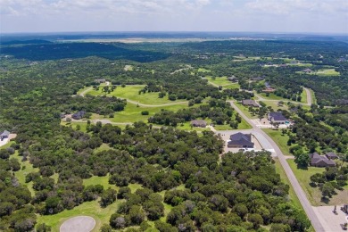 Imagine your dream home tucked within the trees on this over an on The Retreat in Texas - for sale on GolfHomes.com, golf home, golf lot