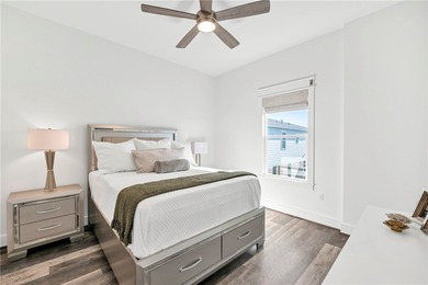 This 4-bedroom, 3-bathroom home is just a short golf cart ride on Palmilla Beach Golf Club in Texas - for sale on GolfHomes.com, golf home, golf lot