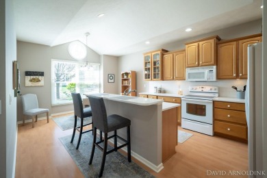 This immaculate 2 bedroom, 2 1/2 bath condo in The Links at on The Links At Rolling Meadows in Michigan - for sale on GolfHomes.com, golf home, golf lot