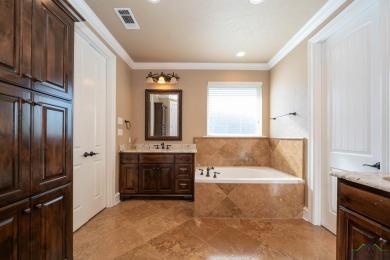 Welcome to this stunning 4-bedroom, 3-bathroom home, offering 2 on The Challenge at Oak Forest in Texas - for sale on GolfHomes.com, golf home, golf lot