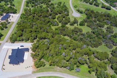 Imagine your dream home tucked within the trees on this over an on The Retreat in Texas - for sale on GolfHomes.com, golf home, golf lot
