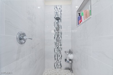 Welcome to this beautifully remodeled 2-bedroom + den, 1st-floor on Shadow Wood Preserve in Florida - for sale on GolfHomes.com, golf home, golf lot