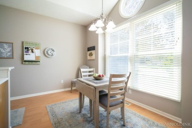 This immaculate 2 bedroom, 2 1/2 bath condo in The Links at on The Links At Rolling Meadows in Michigan - for sale on GolfHomes.com, golf home, golf lot
