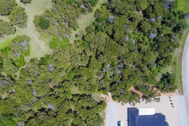Imagine your dream home tucked within the trees on this over an on The Retreat in Texas - for sale on GolfHomes.com, golf home, golf lot