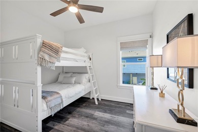 This 4-bedroom, 3-bathroom home is just a short golf cart ride on Palmilla Beach Golf Club in Texas - for sale on GolfHomes.com, golf home, golf lot