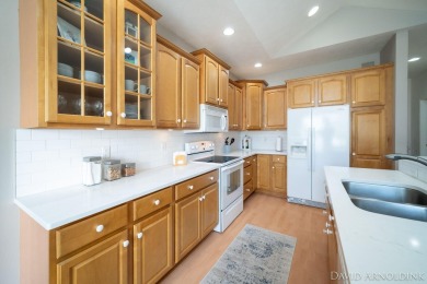 This immaculate 2 bedroom, 2 1/2 bath condo in The Links at on The Links At Rolling Meadows in Michigan - for sale on GolfHomes.com, golf home, golf lot