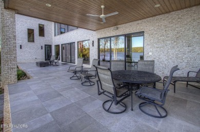 Mountain Modern Main Channel Lakefront Estate built new in 2022 on Tanasi Golf Course in Tennessee - for sale on GolfHomes.com, golf home, golf lot