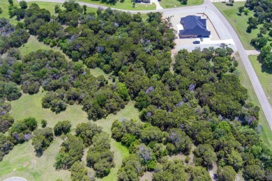 Imagine your dream home tucked within the trees on this over an on The Retreat in Texas - for sale on GolfHomes.com, golf home, golf lot