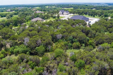 Imagine your dream home tucked within the trees on this over an on The Retreat in Texas - for sale on GolfHomes.com, golf home, golf lot