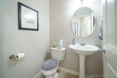 This immaculate 2 bedroom, 2 1/2 bath condo in The Links at on The Links At Rolling Meadows in Michigan - for sale on GolfHomes.com, golf home, golf lot