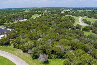 Imagine your dream home tucked within the trees on this over an on The Retreat in Texas - for sale on GolfHomes.com, golf home, golf lot