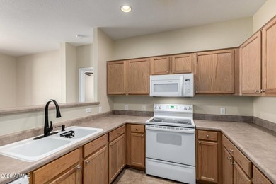 This inviting 2-bedroom, 2-bath unit offers comfort, convenience on Royal Palms Golf Course in Arizona - for sale on GolfHomes.com, golf home, golf lot