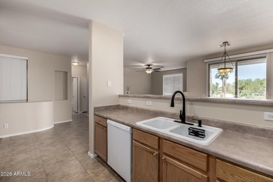 This inviting 2-bedroom, 2-bath unit offers comfort, convenience on Royal Palms Golf Course in Arizona - for sale on GolfHomes.com, golf home, golf lot