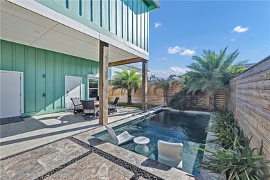 This 4-bedroom, 3-bathroom home is just a short golf cart ride on Palmilla Beach Golf Club in Texas - for sale on GolfHomes.com, golf home, golf lot