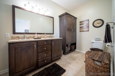 This immaculate 2 bedroom, 2 1/2 bath condo in The Links at on The Links At Rolling Meadows in Michigan - for sale on GolfHomes.com, golf home, golf lot