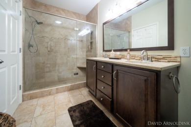 This immaculate 2 bedroom, 2 1/2 bath condo in The Links at on The Links At Rolling Meadows in Michigan - for sale on GolfHomes.com, golf home, golf lot