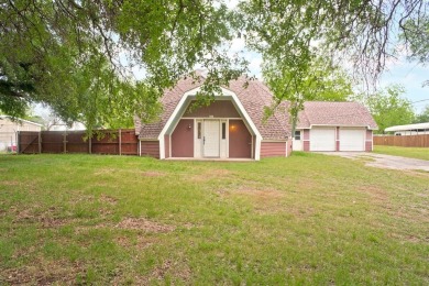 Welcome to this unique and charming home, nestled on the edge of on Horseshoe Bend Country Club in Texas - for sale on GolfHomes.com, golf home, golf lot