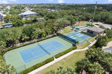 Welcome to this beautifully remodeled 2-bedroom + den, 1st-floor on Shadow Wood Preserve in Florida - for sale on GolfHomes.com, golf home, golf lot