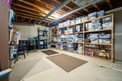 This immaculate 2 bedroom, 2 1/2 bath condo in The Links at on The Links At Rolling Meadows in Michigan - for sale on GolfHomes.com, golf home, golf lot