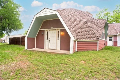 Welcome to this unique and charming home, nestled on the edge of on Horseshoe Bend Country Club in Texas - for sale on GolfHomes.com, golf home, golf lot