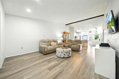 Welcome to this beautifully remodeled villa in the heart of Palm on Highland Lakes Executive Golf Course in Florida - for sale on GolfHomes.com, golf home, golf lot