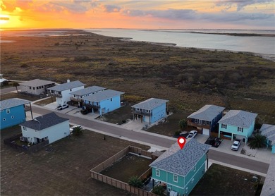 This 4-bedroom, 3-bathroom home is just a short golf cart ride on Palmilla Beach Golf Club in Texas - for sale on GolfHomes.com, golf home, golf lot