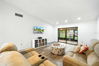 Welcome to this beautifully remodeled villa in the heart of Palm on Highland Lakes Executive Golf Course in Florida - for sale on GolfHomes.com, golf home, golf lot