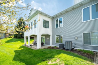 This immaculate 2 bedroom, 2 1/2 bath condo in The Links at on The Links At Rolling Meadows in Michigan - for sale on GolfHomes.com, golf home, golf lot