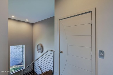 Mountain Modern Main Channel Lakefront Estate built new in 2022 on Tanasi Golf Course in Tennessee - for sale on GolfHomes.com, golf home, golf lot