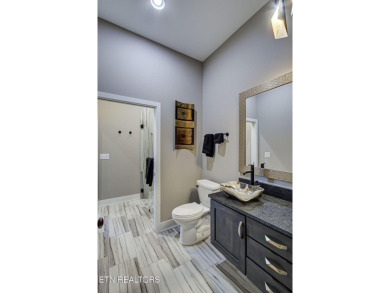 Mountain Modern Main Channel Lakefront Estate built new in 2022 on Tanasi Golf Course in Tennessee - for sale on GolfHomes.com, golf home, golf lot