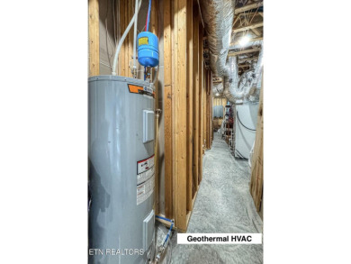 Mountain Modern Main Channel Lakefront Estate built new in 2022 on Tanasi Golf Course in Tennessee - for sale on GolfHomes.com, golf home, golf lot