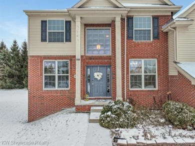 Nestled in the heart of Commerce Township, this grand 4-bedroom on Union Lake Golf Course in Michigan - for sale on GolfHomes.com, golf home, golf lot