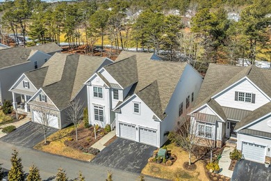 Overlooking the 18th hole of the Jones Golf Course, this elegant on Pinehills Golf Club  in Massachusetts - for sale on GolfHomes.com, golf home, golf lot