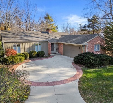 Contemporary ranch nestled on a private lot in prime Wind Point on Shoop Park Golf Course in Wisconsin - for sale on GolfHomes.com, golf home, golf lot