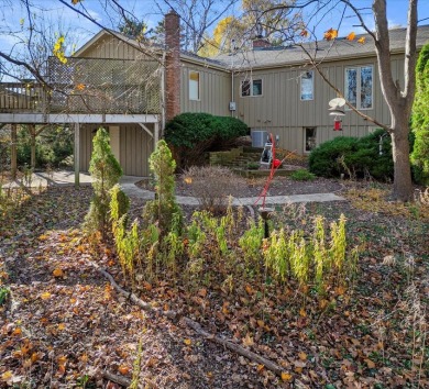 Contemporary ranch nestled on a private lot in prime Wind Point on Shoop Park Golf Course in Wisconsin - for sale on GolfHomes.com, golf home, golf lot