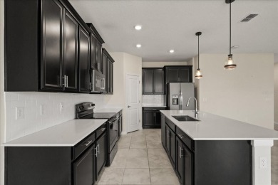 **This property qualifies for a closing cost credit up to $5,700 on ChampionsGate Golf Resort in Florida - for sale on GolfHomes.com, golf home, golf lot