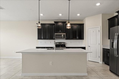 **This property qualifies for a closing cost credit up to $5,700 on ChampionsGate Golf Resort in Florida - for sale on GolfHomes.com, golf home, golf lot