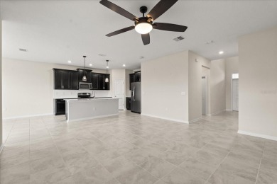 **This property qualifies for a closing cost credit up to $5,700 on ChampionsGate Golf Resort in Florida - for sale on GolfHomes.com, golf home, golf lot