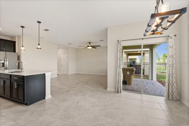 **This property qualifies for a closing cost credit up to $5,700 on ChampionsGate Golf Resort in Florida - for sale on GolfHomes.com, golf home, golf lot