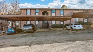 Beautifully updated and move-in ready, this ground-level condo on The Golf Club At Redlands Mesa in Colorado - for sale on GolfHomes.com, golf home, golf lot